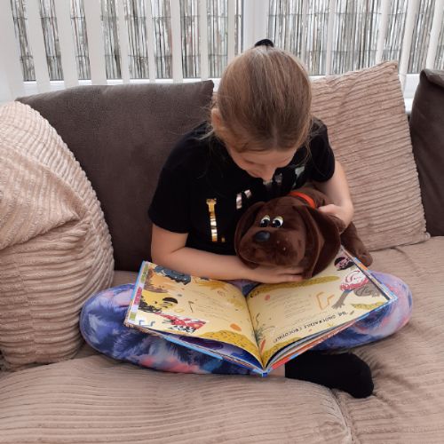 Lexie with reading dog.jpg